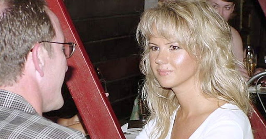 A foreign woman talking to a foreign man